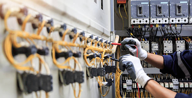 Professional Electrician technician working in Edina, MO